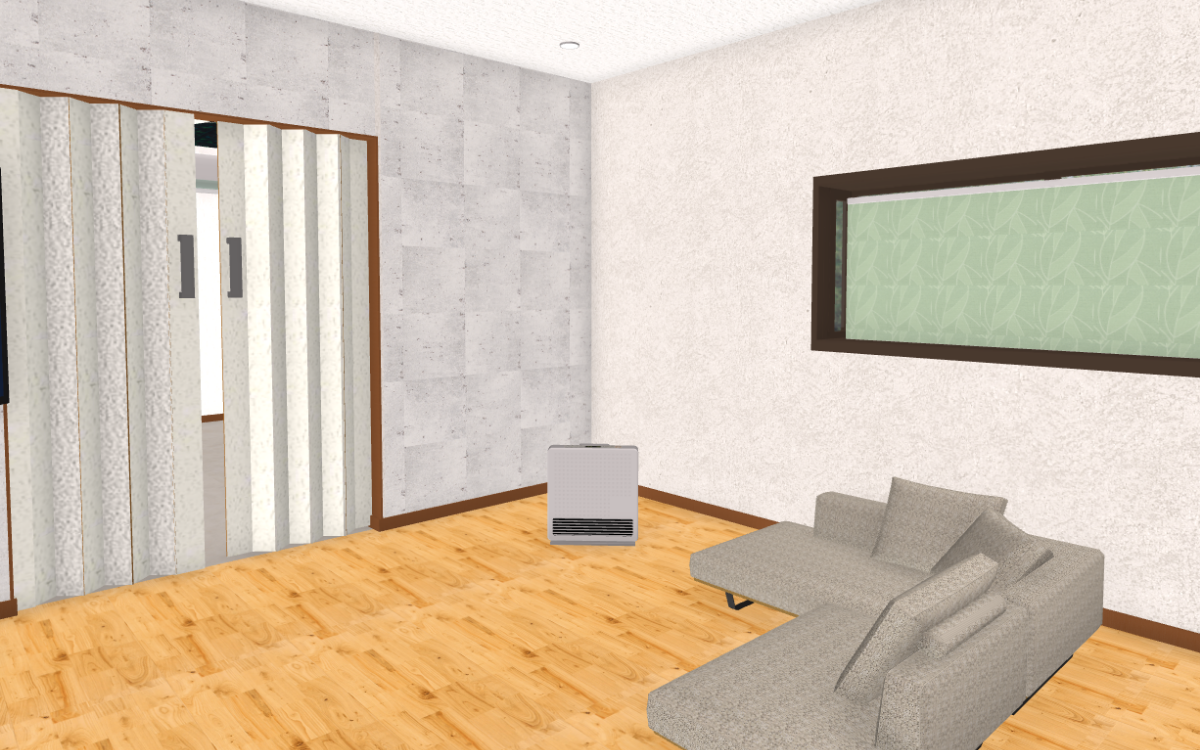 ヒーターとソファが置いてあるリビング